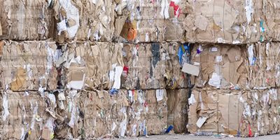 Paper pulp compressed blocks at recycle plant centre in China
